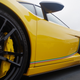 Illustration for article titled Supercars Took Over A Garage To Welcome The $1.9 Million Lamborghini Centenario